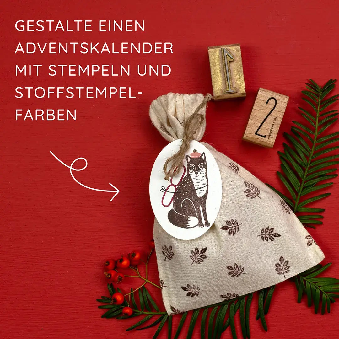 stempel weihnachten stoffstempelfarbe adventskalender stoffsäckchen bestempeln