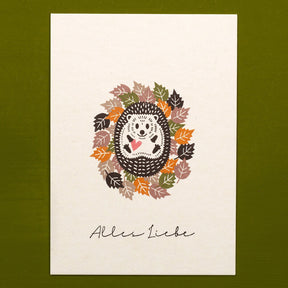 Greeting card | Hedgehog in a whirlwind of leaves